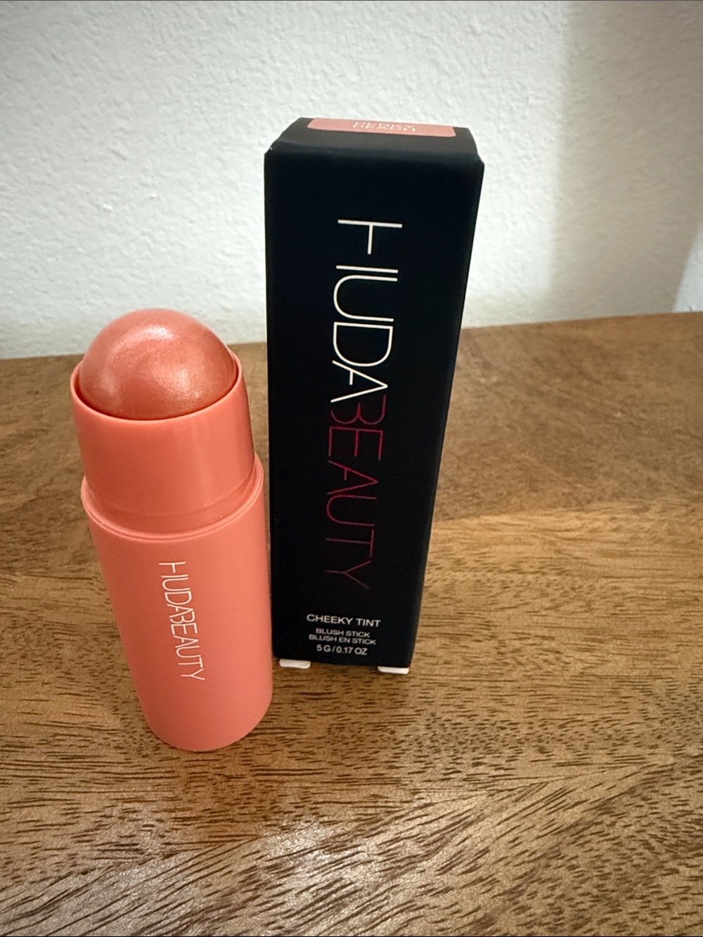HUDA BEAUTY Cheeky Tint Blush Stick — Coral Peach Shimmer